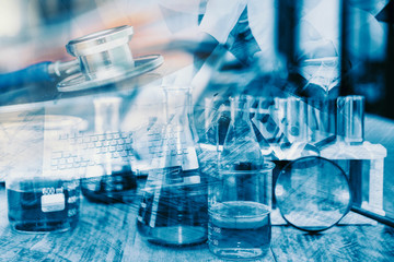 Double exposure of stethoscope with test tube and chemical structure in blue pharmaceutical research science laboratory background