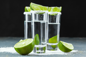 Mexican Tequila in short glasses with lime and salt