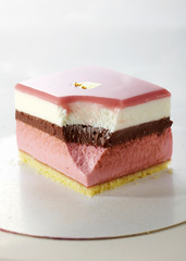 Delicious cheese cheesecake on a white background