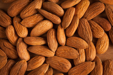 mix of nuts on a wooden table