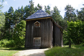 Ancient wooden church with a bell, Latvia