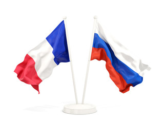 Two waving flags of France and russia