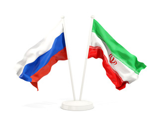 Two waving flags of Russia and iran
