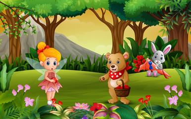 Cute fairy with a bear and rabbit in the beautiful nature