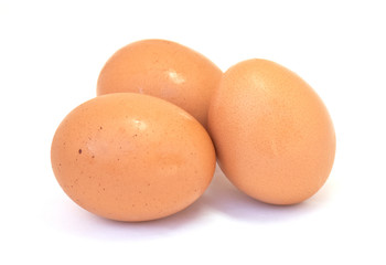 Three eggs on white background.