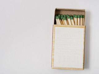 matches sulfur in a cardboard box on a white background.