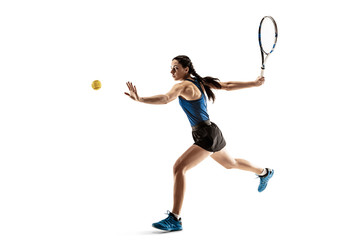Full length portrait of young woman playing tennis isolated on white background. Healthy lifestyle....