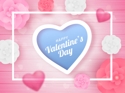 Top view of poster or banner design decorated with paper cut flowers for Valentine's Day celebration.