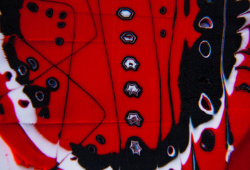 Unique pattern abstract art from polymer clay. Black red white background. Wallpaper Illistration.