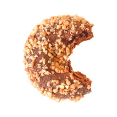 Bitten donut chocolate sprinkled with nuts  isolated on white background
