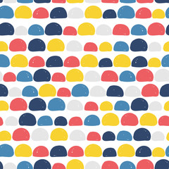 Seamless pattern with colourful semicircles. Cute kids print. Vector hand drawn illustration. 