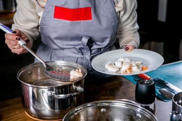 Master class in the kitchen. The process of cooking. Chef cooks shrimp. Step by step. Tutorial. Close-up
