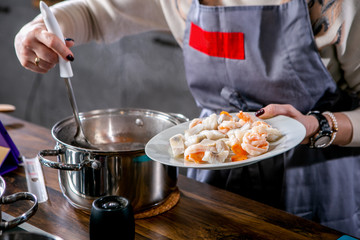 Chef cooks shrimp. Master class in the kitchen. The process of cooking. Step by step. Tutorial. Close-up
