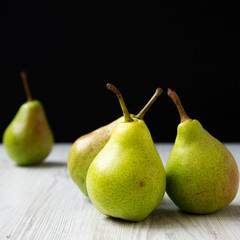 Fototapeta na wymiar Tasty fresh pears, side view. Close-up. Organic fruits.