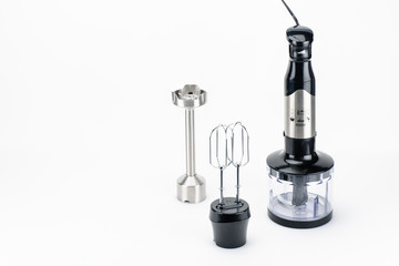 Blender with accessory on the white matt background with copy space