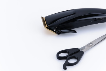 Close up of Hair Barber Clippers, Haircut accessories on white background with copy space. Focus on the knife.