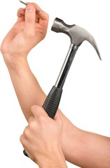 Hammer hitting a nail