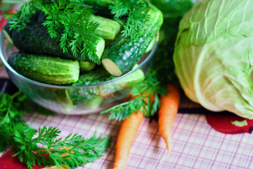 Fresh vegetables on wooden and blur background.