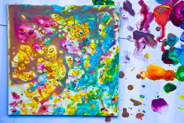 Fototapeta na wymiar Fluid Art. Creative artwork acrylic paint.Fluid Acrylic Splash.Watercolor background.Pink yellow abstract.Working process.