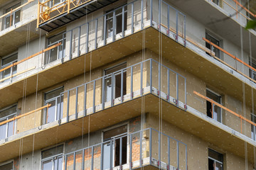 Low angle top view of building insulation on wall and ceiling