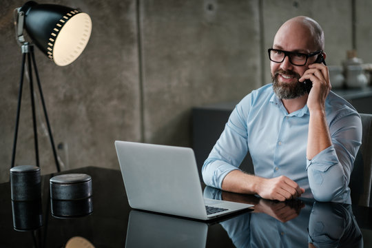 Middle-aged designer working in an office