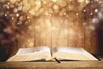 Holy Bible  book on a wooden background