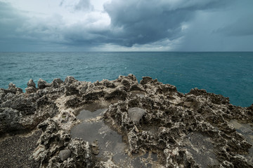 Rocky coast beach Waterblow in Bali, Indonesia
