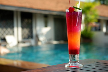 butterfly pea punch mocktail at poolside bar