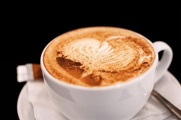 Cup Of Coffee With Whipped Cream And Cinnamon