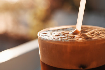 Cold Greek Frappe Coffee With Foam And Vanilla Ice Cream At Sunset