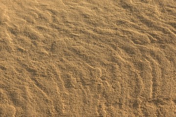 Fototapeta na wymiar Yellow sand texture.