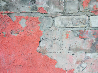 Old grunge cracked vintage light grey concrete and cement mold texture wall or floor background with pink weathered paint and scratches