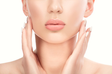 Beautiful young woman. Lips, part of the face. Facial treatment. Cosmetology, beauty and spa