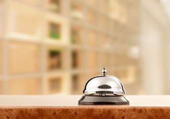 Vintage hotel reception service desk bell.