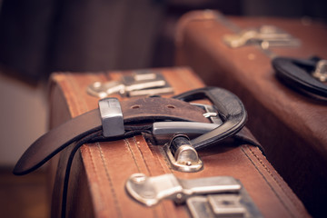 Vintage suitcase strapped belt