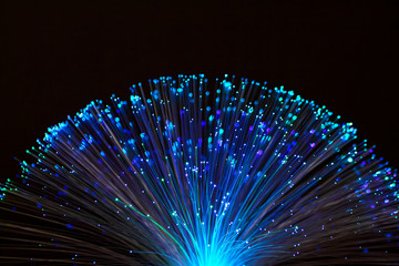 Colourful fibre optic light isolated on a black background