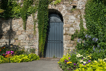 Door and stone wall on the promenade Clair de lune in Dinard