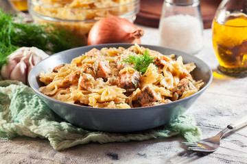 Creamy farfalle pasta with salmon, parmesan cheese and dill