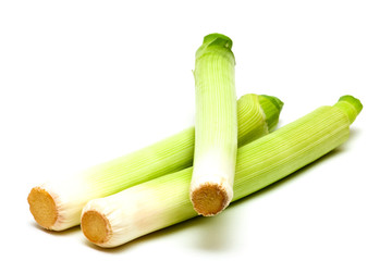 Raw leeks isolated on a white background