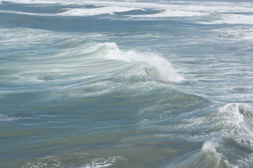 Blue breaking waves