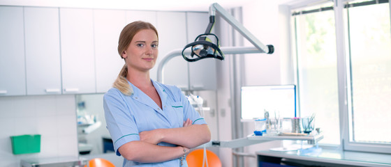 Female dentist in dental clinic.