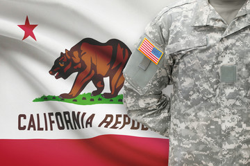 American soldier with US state flag on background - California