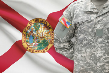 American soldier with US state flag on background - Florida