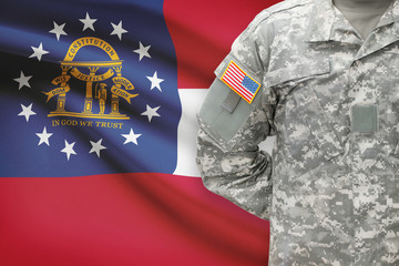 American soldier with US state flag on background - Georgia