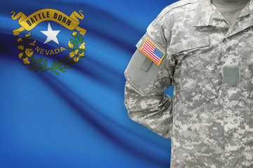 American soldier with US state flag on background - Nevada