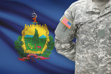 American soldier with US state flag on background - Vermont
