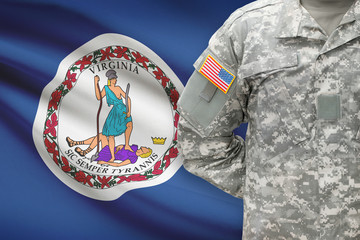 American soldier with US state flag on background - Virginia