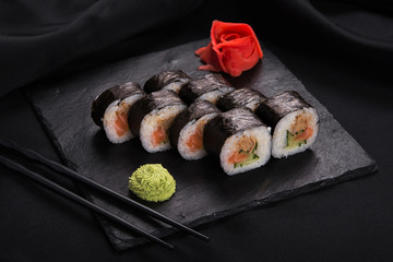 Sushi roll with wasabi and ginger