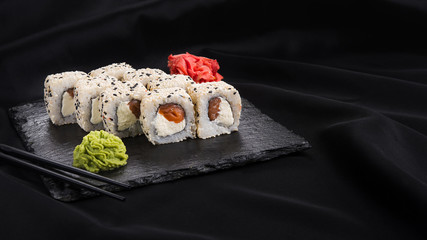 Sushi roll with wasabi and ginger
