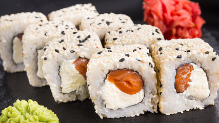 Sushi roll with wasabi and ginger